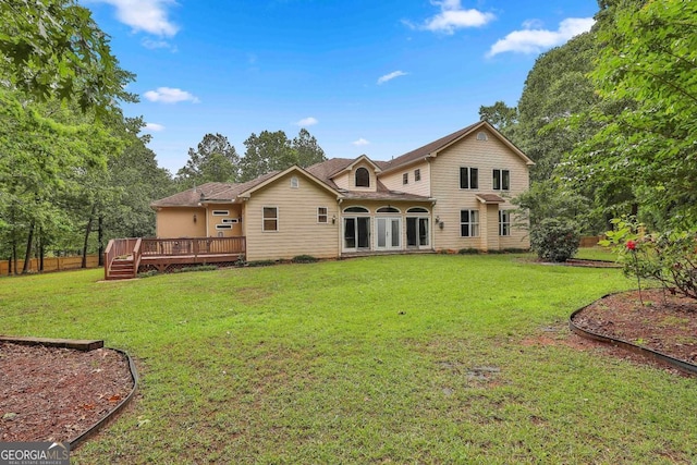 226 Long Island Dr, Whitesburg, GA 30185 - back of property with a wooden deck