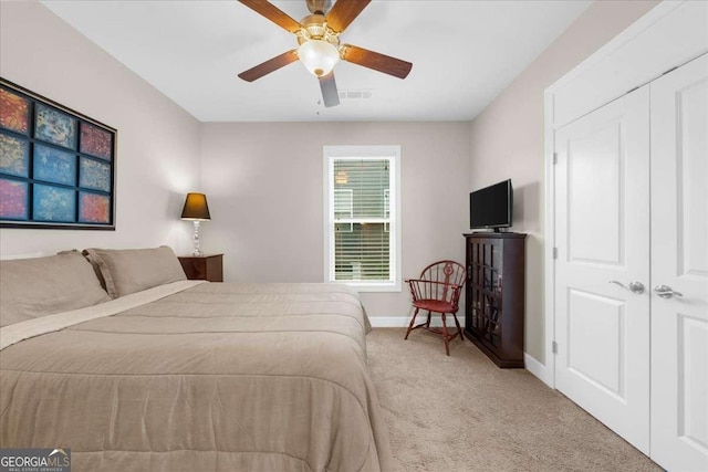 3554 Black Cherry Pt SW, Gainesville, GA 30504 - carpeted bedroom with baseboards and ceiling fan