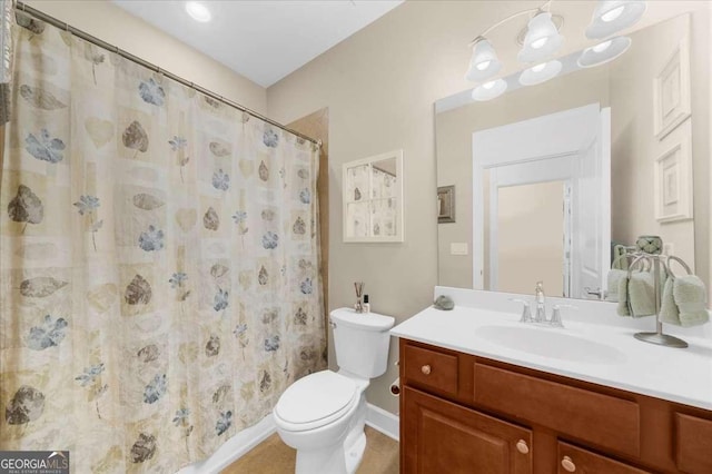 3554 Black Cherry Pt SW, Gainesville, GA 30504 - bathroom with toilet, vanity, baseboards, and a shower with shower curtain