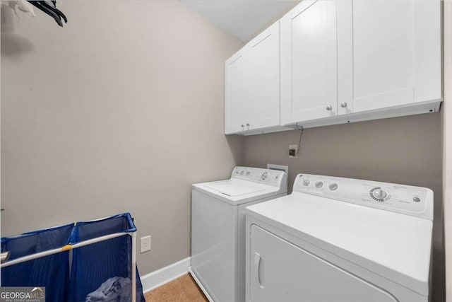 3554 Black Cherry Pt SW, Gainesville, GA 30504 - washroom with cabinet space, washer and clothes dryer, and baseboards