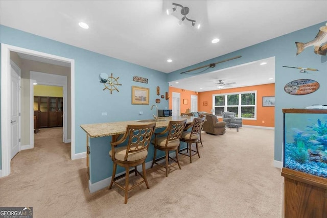 3554 Black Cherry Pt SW, Gainesville, GA 30504 - bar area with light carpet, a ceiling fan, baseboards, recessed lighting, and a sink