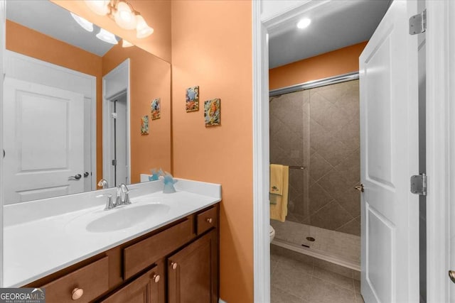 3554 Black Cherry Pt SW, Gainesville, GA 30504 - bathroom with vanity, tile patterned flooring, a shower stall, and toilet