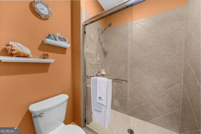 3554 Black Cherry Pt SW, Gainesville, GA 30504 - bathroom with toilet and a shower stall