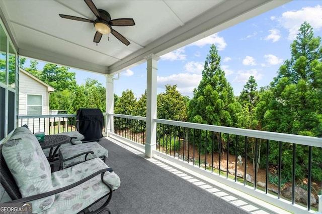 3554 Black Cherry Pt SW, Gainesville, GA 30504 - balcony featuring ceiling fan, a grill, and view of scattered trees