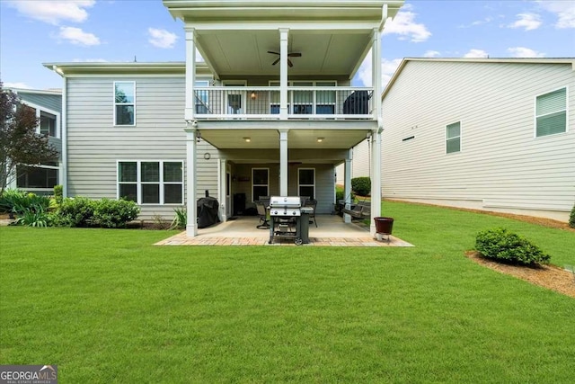 3554 Black Cherry Pt SW, Gainesville, GA 30504 - back of property featuring a balcony, a lawn, a patio area, and a ceiling fan