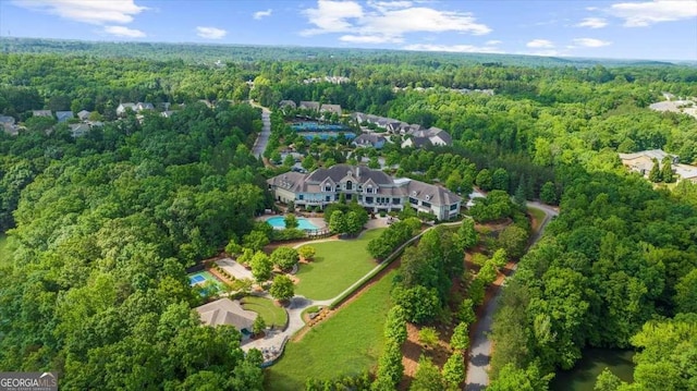 3554 Black Cherry Pt SW, Gainesville, GA 30504 - aerial view of property and surrounding area featuring a heavily wooded area and a pool