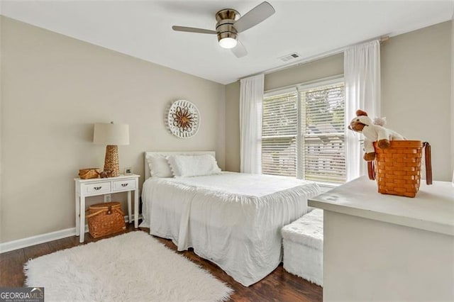 2073 Woodside Park Dr, Woodstock, GA 30188 - bedroom with wood finished floors, baseboards, and a ceiling fan