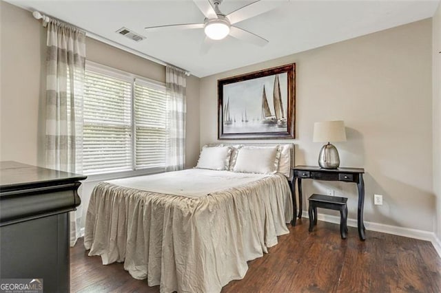 2073 Woodside Park Dr, Woodstock, GA 30188 - bedroom with wood finished floors, baseboards, and a ceiling fan