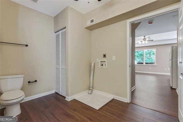 2073 Woodside Park Dr, Woodstock, GA 30188 - bathroom with a ceiling fan, toilet, wood finished floors, and baseboards