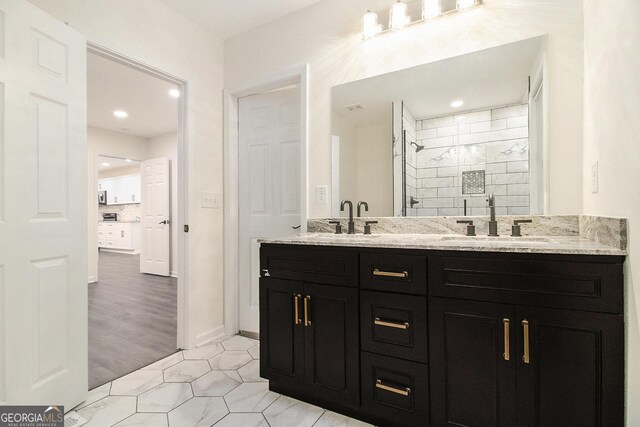 523 Mount Zion, Hapeville, GA 30354 - bathroom with a shower stall, double vanity, tile patterned flooring, recessed lighting, and baseboards
