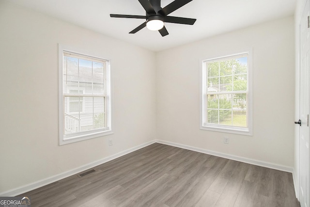 523 Mount Zion, Hapeville, GA 30354 - spare room featuring wood finished floors, ceiling fan, and baseboards