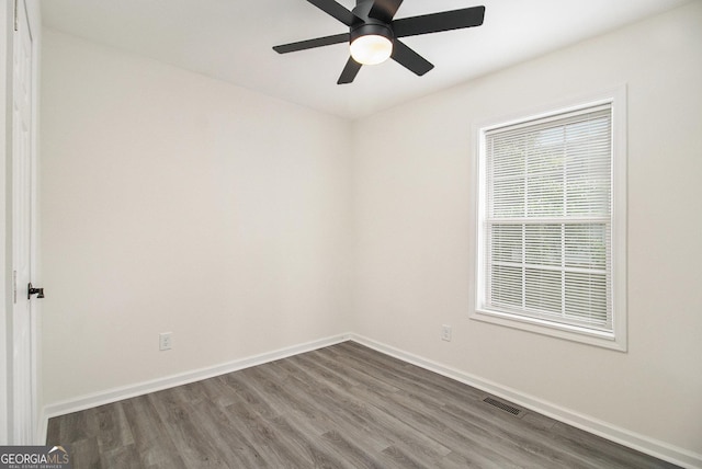 523 Mount Zion, Hapeville, GA 30354 - spare room featuring wood finished floors, baseboards, and ceiling fan
