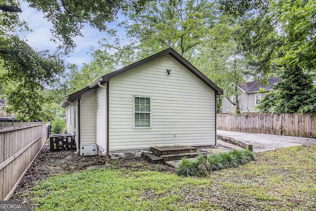 523 Mount Zion, Hapeville, GA 30354 - back of house featuring central air condition unit and a patio
