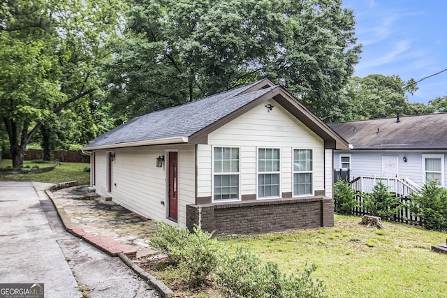 523 Mount Zion, Hapeville, GA 30354 - view of front of house featuring a shingled roof and brick siding
