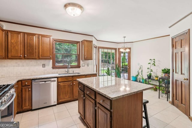 6165 Pin Oak Ln, Alpharetta, GA 30005 - kitchen with appliances with stainless steel finishes, a sink, tasteful backsplash, light tile patterned floors, and brown cabinetry