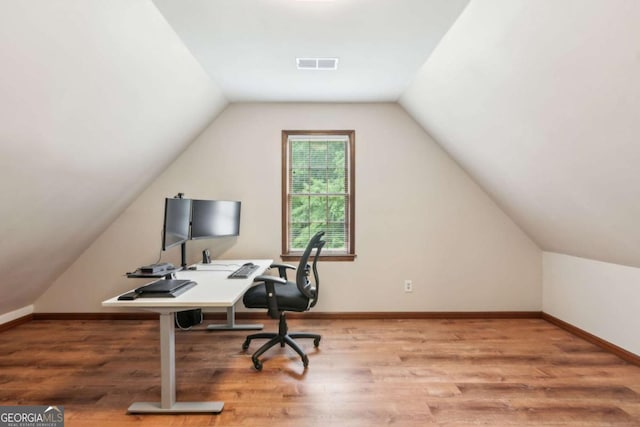 6165 Pin Oak Ln, Alpharetta, GA 30005 - office area featuring wood finished floors, lofted ceiling, and baseboards