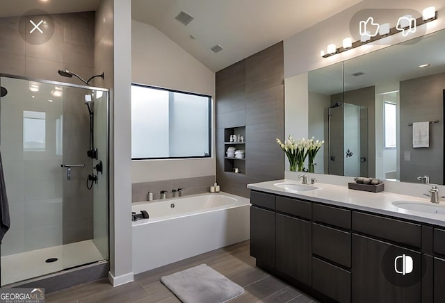 145 Silver Mine Trl, Austell, GA 30168 - full bath featuring a shower stall, a bath, lofted ceiling, double vanity, and wood finished floors