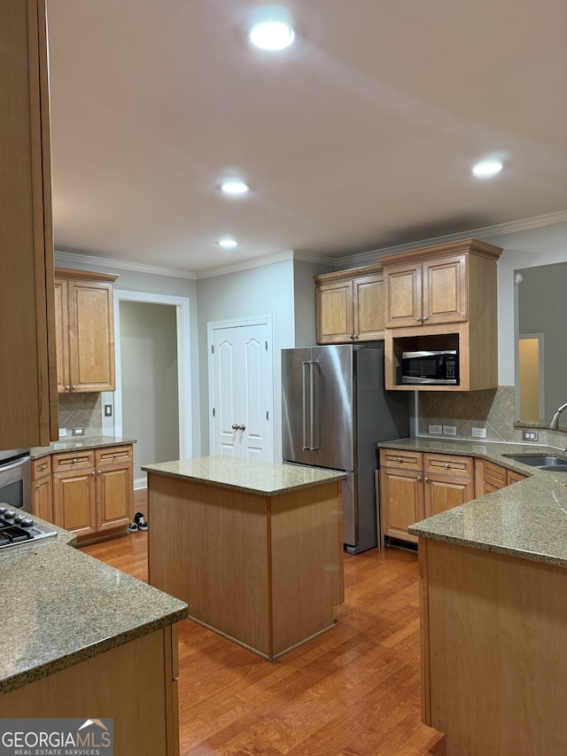 2360 Barrington Trace Cir SW, South Fulton, GA 30331 - kitchen with high end fridge, a sink, crown molding, light wood-style flooring, and a kitchen island