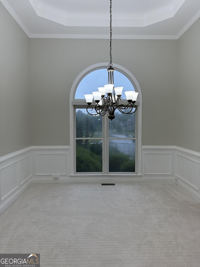 2360 Barrington Trace Cir SW, South Fulton, GA 30331 - detailed view of a tray ceiling, a chandelier, carpet flooring, a wainscoted wall, and a decorative wall