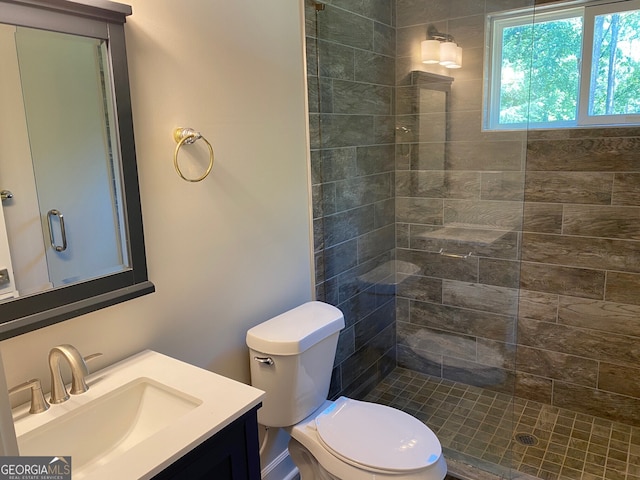 5950 Lynfield Dr, South Fulton, GA 30349 - full bath featuring vanity, tiled shower, and toilet