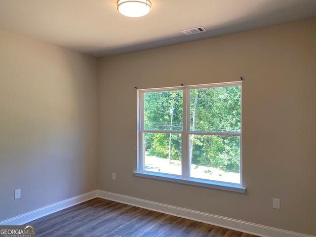 5950 Lynfield Dr, South Fulton, GA 30349 - empty room with baseboards and dark wood-style flooring