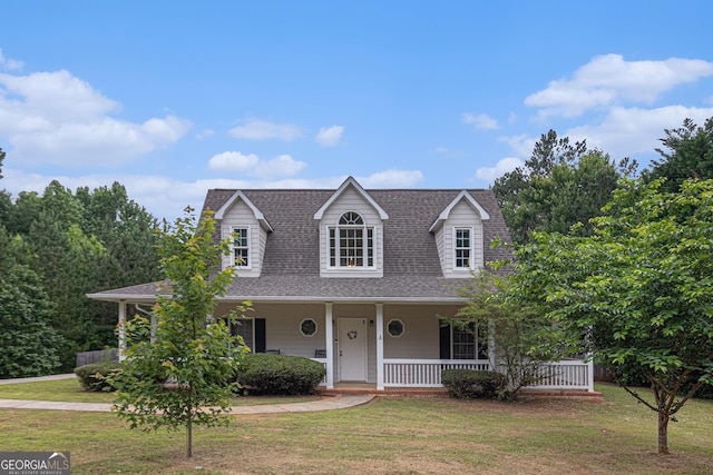 385 Eagles Nest Cir, Carrollton, GA 30116 - cape cod home with a front lawn, roof with shingles, and a porch