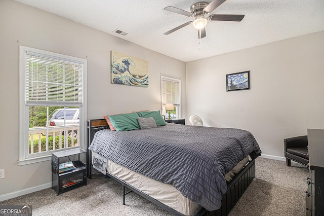 385 Eagles Nest Cir, Carrollton, GA 30116 - bedroom featuring carpet floors, baseboards, and a ceiling fan