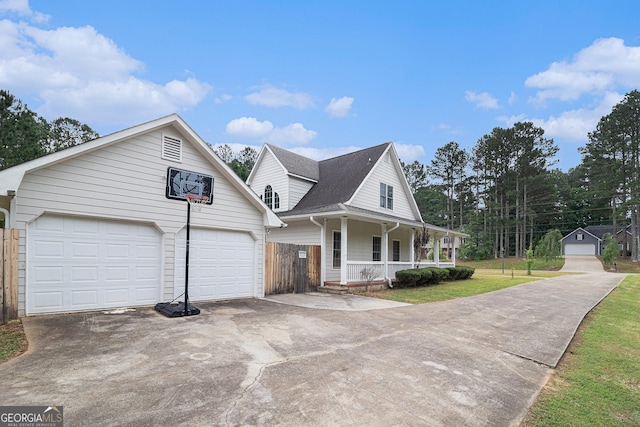 385 Eagles Nest Cir, Carrollton, GA 30116 - view of front facade featuring a porch, asphalt driveway, and a shingled roof