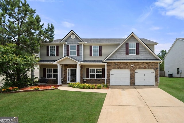 143 Monarch Way, Hiram, GA 30141 - craftsman inspired home featuring driveway, a front lawn, central AC unit, and stone siding