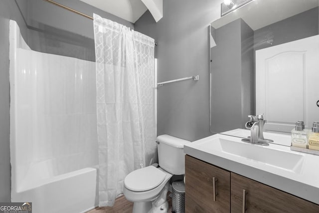 143 Monarch Way, Hiram, GA 30141 - bathroom featuring vanity, shower / bath combo with shower curtain, toilet, and wood finished floors