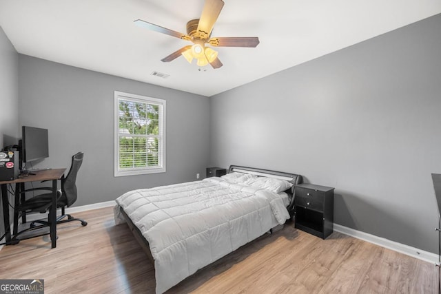 143 Monarch Way, Hiram, GA 30141 - bedroom featuring wood finished floors, baseboards, ceiling fan, and a desk