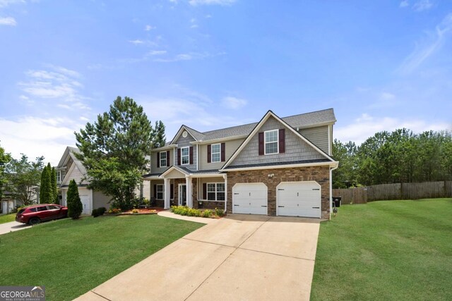 143 Monarch Way, Hiram, GA 30141 - craftsman house featuring driveway, a garage, and a porch