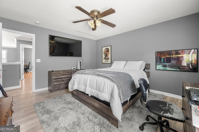 143 Monarch Way, Hiram, GA 30141 - bedroom with baseboards, wood finished floors, and a ceiling fan