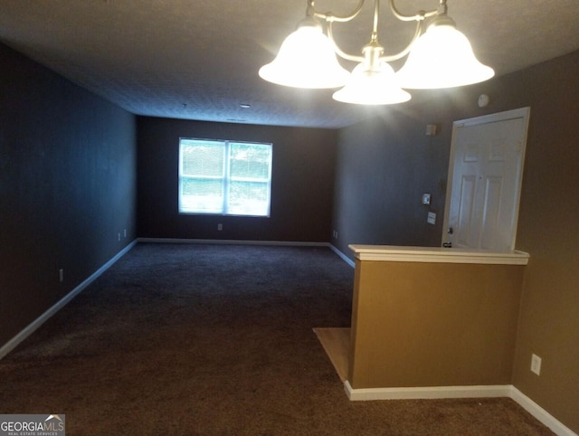 8202 Fairington Village Dr, Lithonia, GA 30038 - carpeted empty room with a chandelier and baseboards