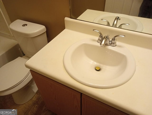 8202 Fairington Village Dr, Lithonia, GA 30038 - bathroom with toilet and vanity