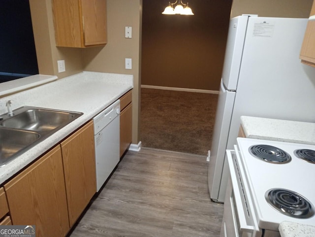 8202 Fairington Village Dr, Lithonia, GA 30038 - kitchen featuring white appliances, a sink, light colored carpet, and light countertops