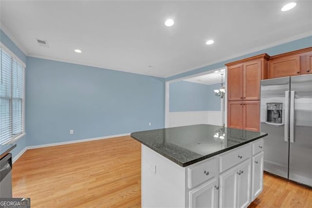 6206 Carriage Gate Ln Unit 6, Mableton, GA 30126 - kitchen with stainless steel fridge, light wood-style floors, crown molding, a center island, and white cabinets