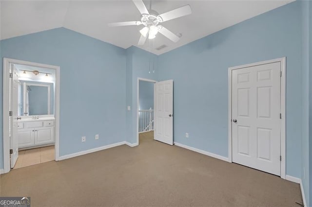 6206 Carriage Gate Ln Unit 6, Mableton, GA 30126 - unfurnished bedroom with carpet floors, vaulted ceiling, connected bathroom, and ceiling fan