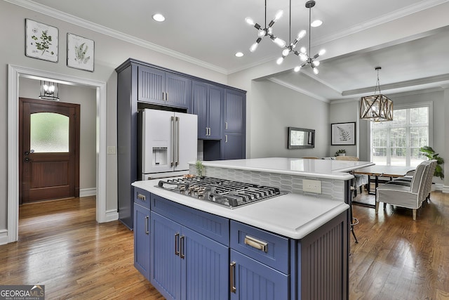 210 Short Rd, Sharpsburg, GA 30277 - kitchen with a chandelier, stainless steel gas cooktop, high end fridge, blue cabinets, and dark wood-style floors
