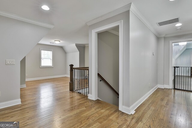 210 Short Rd, Sharpsburg, GA 30277 - corridor featuring an upstairs landing, light wood-style floors, baseboards, crown molding, and recessed lighting