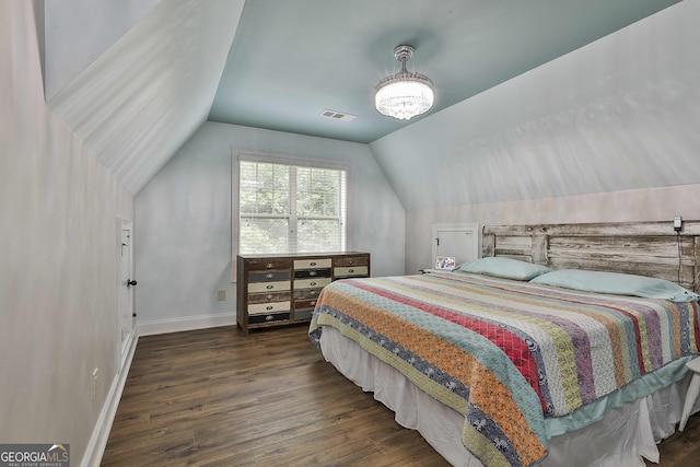 210 Short Rd, Sharpsburg, GA 30277 - bedroom featuring wood finished floors, vaulted ceiling, and baseboards