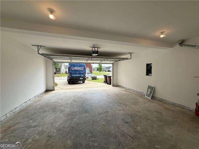 1720 New Orleans Way, Mcdonough, GA 30252 - garage with a garage door opener and baseboards
