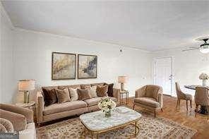 1150 Collier Rd NW Unit K9, Atlanta, GA 30318 - living room with a ceiling fan