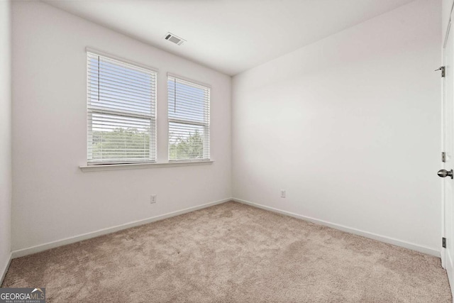 1172 Edwin Ln, Sugar Hill, GA 30518 - spare room featuring carpet flooring and baseboards