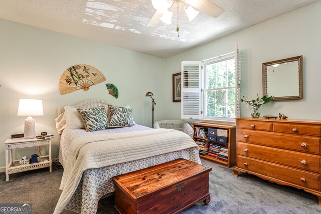 1750 Clairmont Rd Unit 35, Decatur, GA 30033 - carpeted bedroom featuring a textured ceiling and a ceiling fan