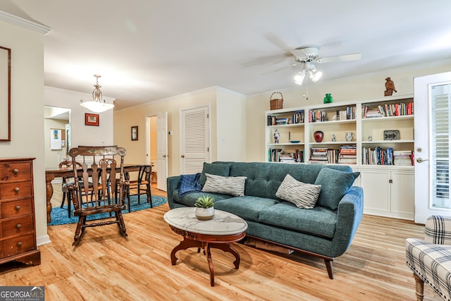 1750 Clairmont Rd Unit 35, Decatur, GA 30033 - living room with light wood-type flooring, crown molding, and ceiling fan