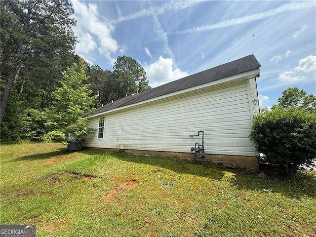 160 Goldleaf Dr, Hampton, GA 30228 - view of side of home with a lawn
