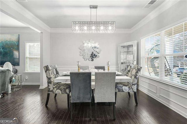 200 Cherokee Reserve Cir, Canton, GA 30115 - dining room with a chandelier, hardwood / wood-style floors, crown molding, a decorative wall, and healthy amount of natural light