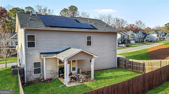 200 Cherokee Reserve Cir, Canton, GA 30115 - rear view of house with roof mounted solar panels, a patio, and cooling unit