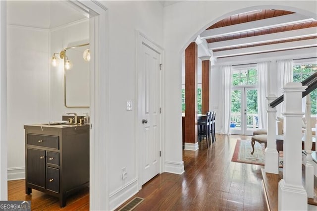 4356 N Buckhead Dr NE, Atlanta, GA 30342 - entryway featuring arched walkways, dark wood-style floors, and french doors